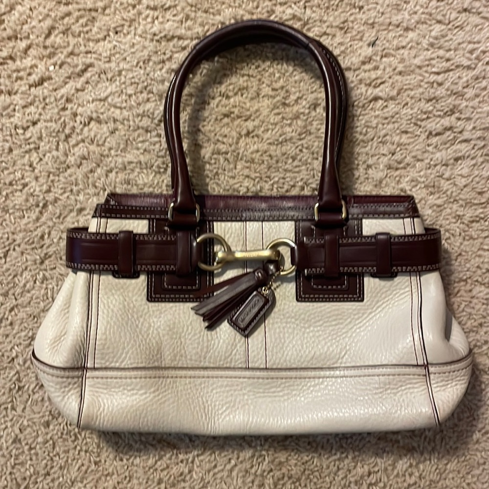 Coach white and brown leather handbag.